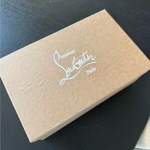 Christian Louboutin Red and Tan Soles